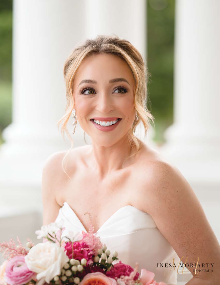 Smiling bride with bouquet